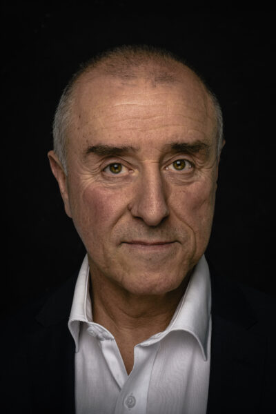 Headshot of man in suit